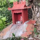 Illustration of Red Asian Pagoda in Lush Greenery