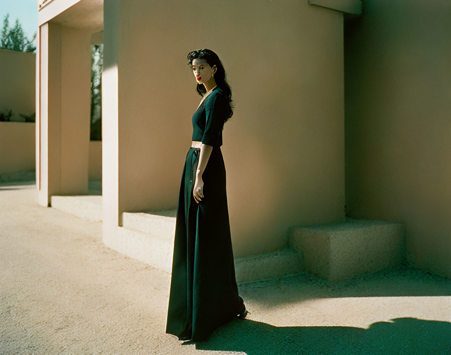 Vintage Black Dress and Gloves: Elegant Woman in Dramatic Sunlight