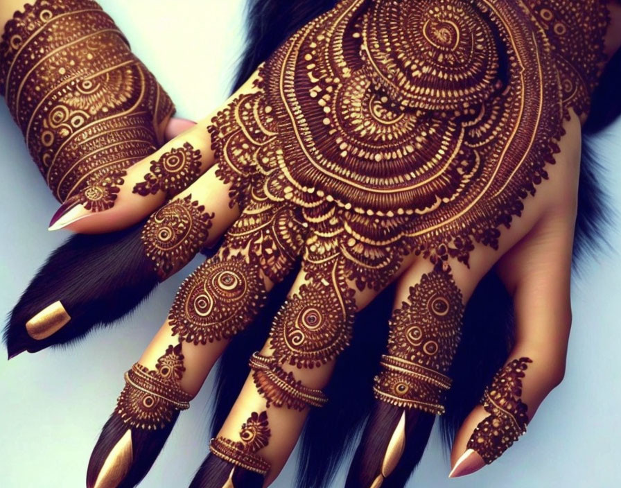 Detailed Brown Henna Designs on Manicured Hands Against Blue Background