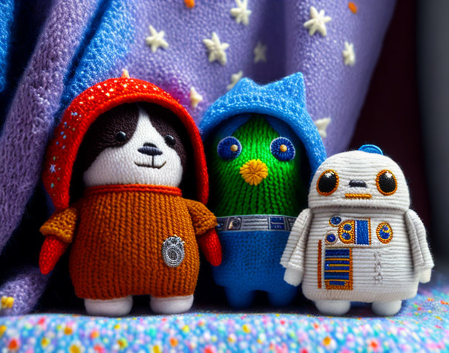Plush Star Wars Character Toys in Knit Costumes on Starry Fabric