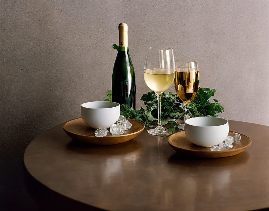 White Wine Bottle and Glasses on Wooden Table with Ice Bowls