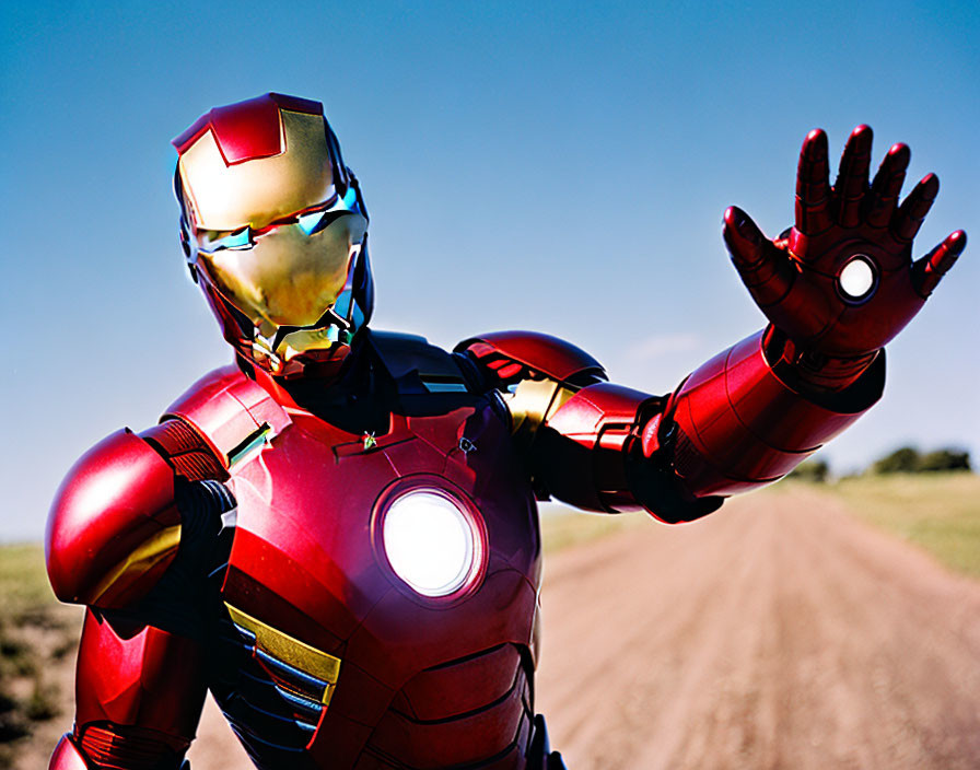 Person in Iron Man costume posing under clear blue sky