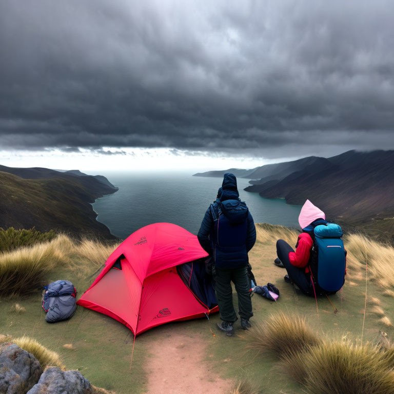 Hikers at Red Tent by Serene Lake and Mountains