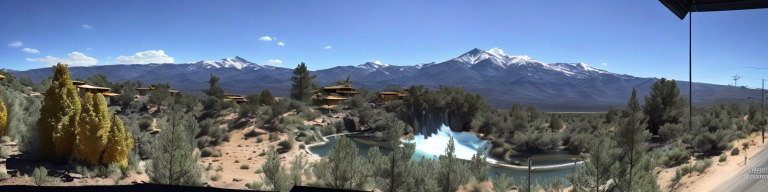 Tranquil oasis with blue pond, lush trees, snow-capped mountains, clear sky