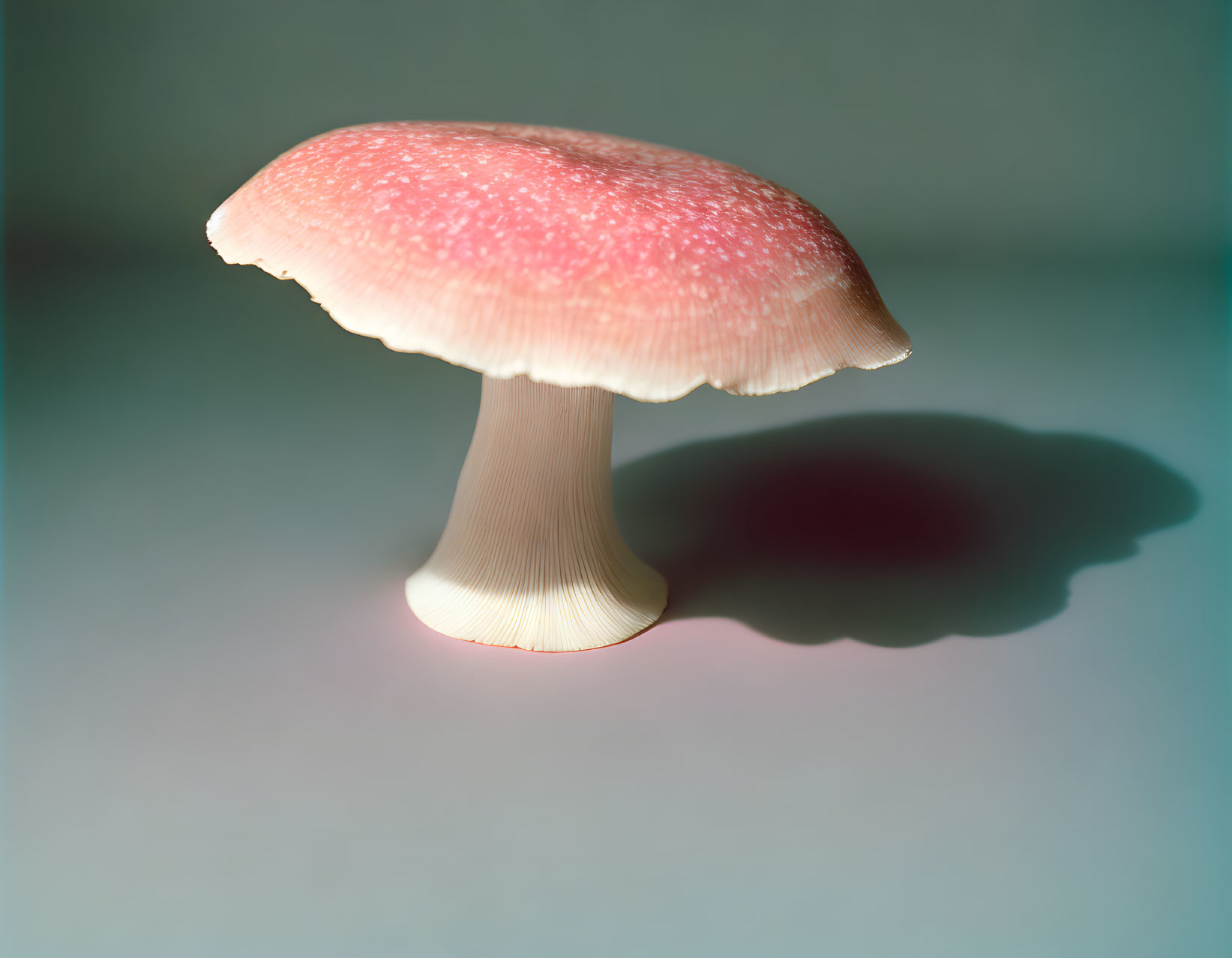 Red-Capped Mushroom with White Spots on Pastel Background