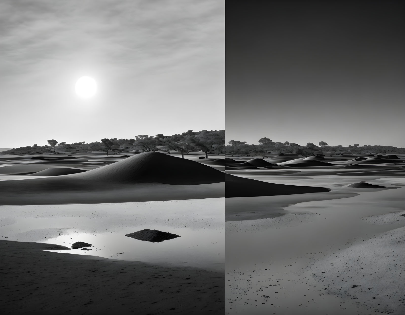 Monochrome desert landscape with sun over dunes