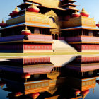 Colorful Multi-Tiered Asian Temple Reflecting on Water