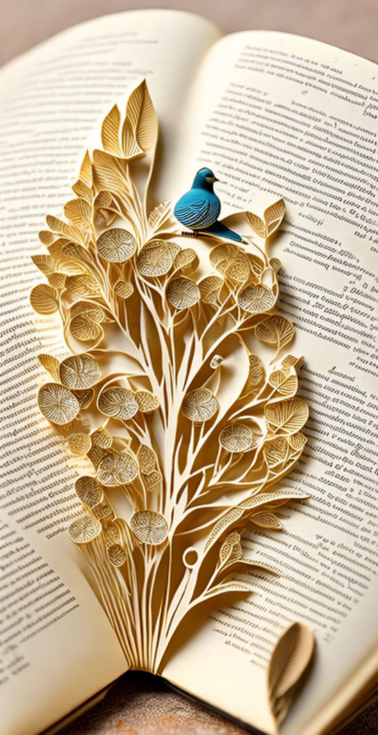 Paper art tree with leaves and blue bird in open book display