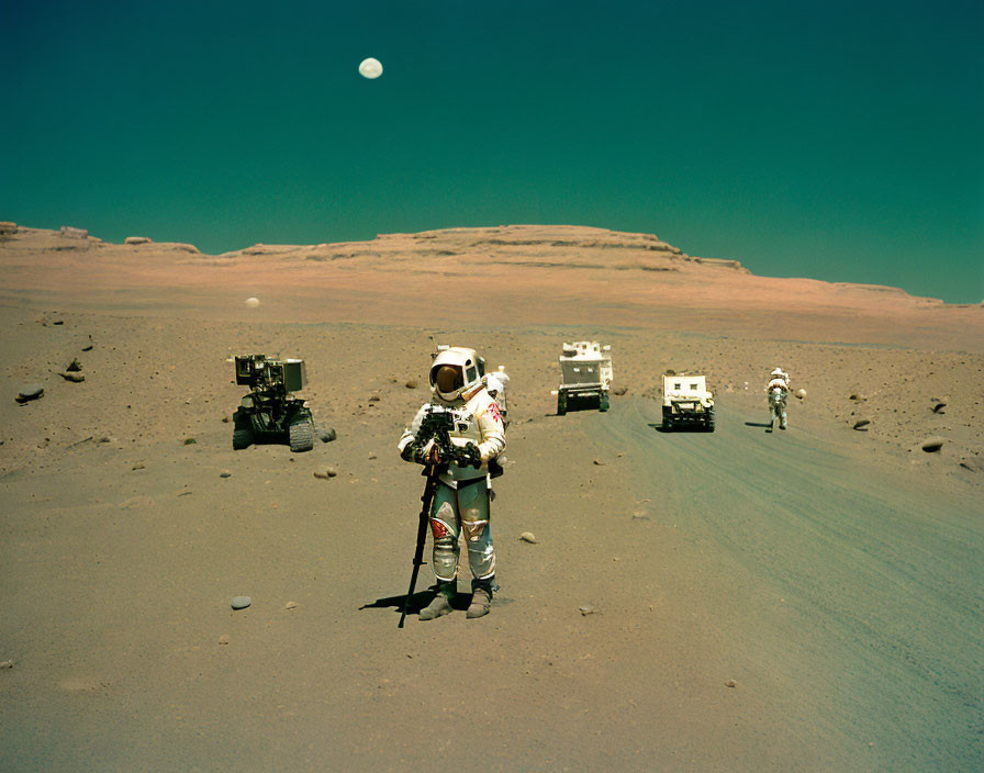 Astronaut in spacesuit on Mars-like terrain with rovers and Earth in sky