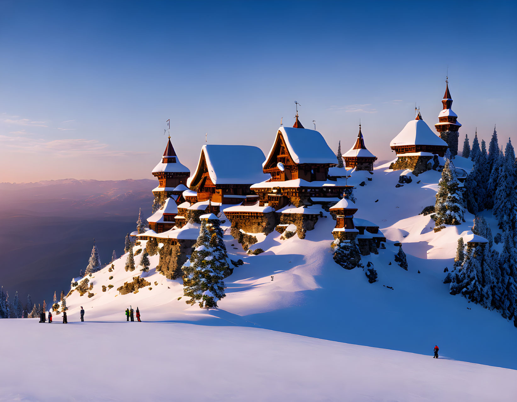 Snow-covered multi-turreted chalet in warm sunset light surrounded by pristine snow.