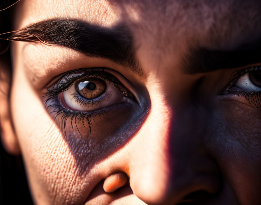 Detailed Close-up of Sunlit Eyes and Skin Texture