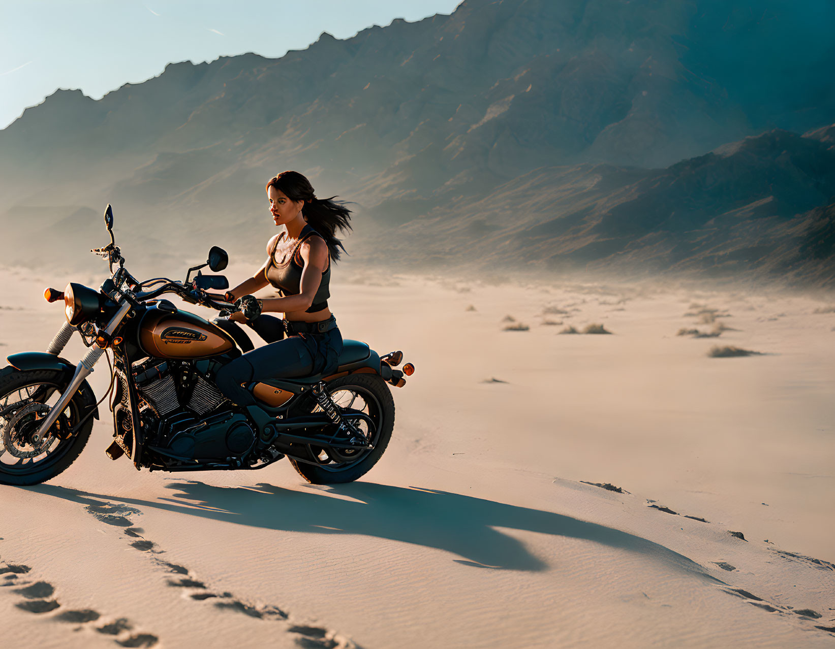 Woman on Cruiser Motorcycle Resting in Desert Landscape