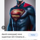 Stylized Superman depiction with strong jawline and iconic curl in hair