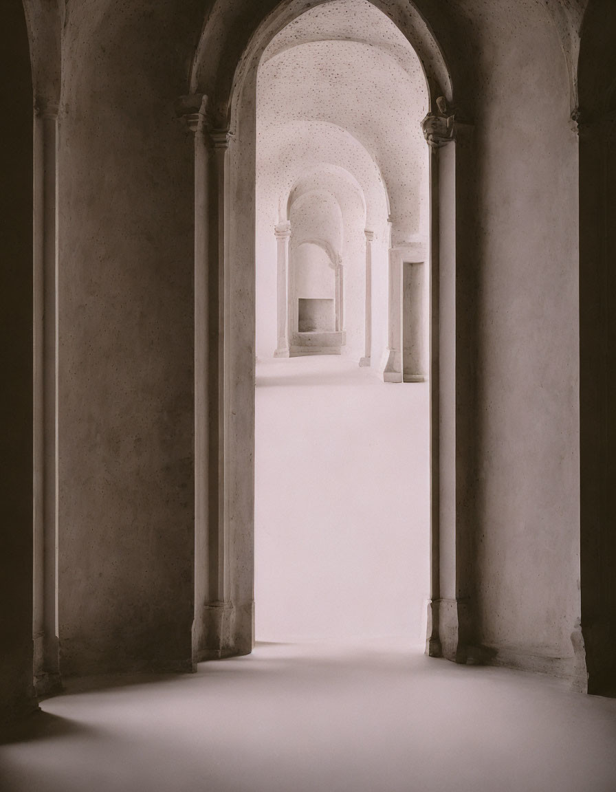 Arched Doorway Leading to Serene Corridor with Soft Light