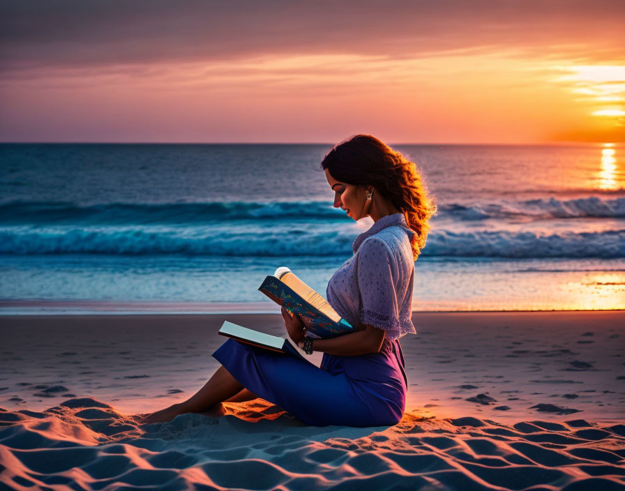 Woman Reading Book on Sandy Beach at Sunset with Orange and Blue Sky