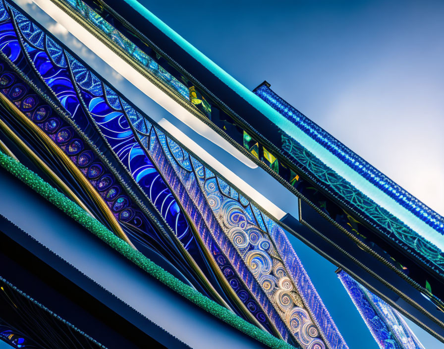 Modern building with intricate blue patterns and balconies under clear sky