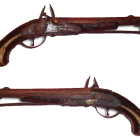 Vintage Flintlock Pistols with Metal Engraving and Wooden Handles