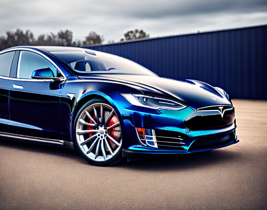 Blue Tesla Model S with Chrome Trim and Red Brake Calipers Parked Outdoors