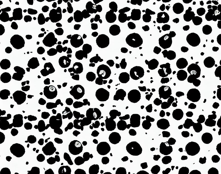 Monochrome abstract ink splatters on white background