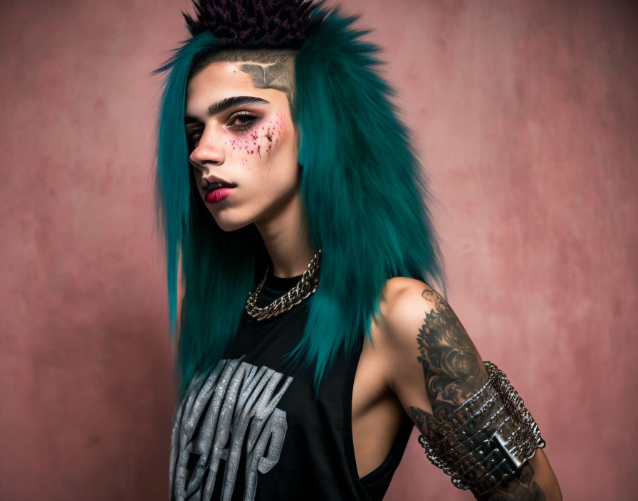 Person with Vibrant Teal Spiked Hair, Star Face Paint, Tattoo, and Punk Accessories