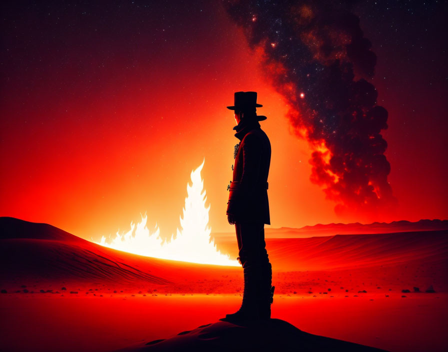 Person in hat silhouette watches fire in desert at night