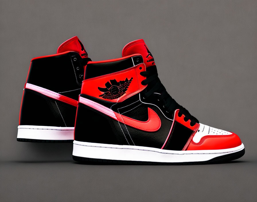 Black and Red High-Top Sneakers with White Soles on Grey Background