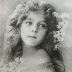 Young woman with flowers in hair gazing into distance on light-infused backdrop