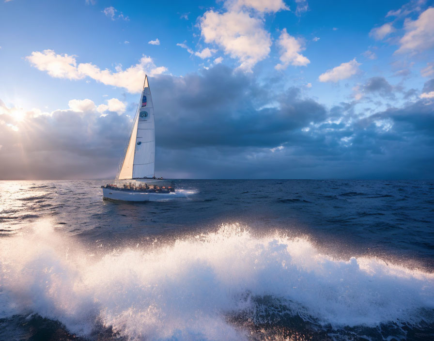 Sailboat in choppy seas with splashing waves and dramatic sunset sky.