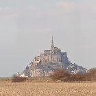 Fantastical island castle with spires in a surreal landscape