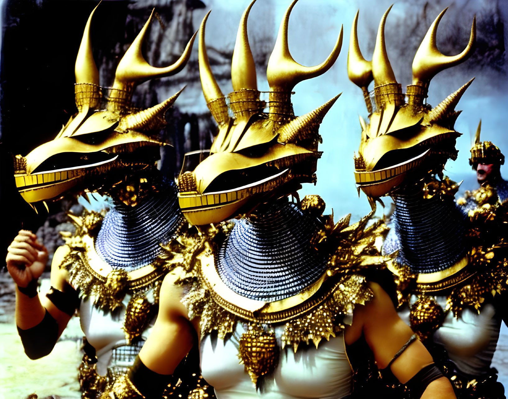 Elaborate Golden Costumes and Horned Headdresses on Performers