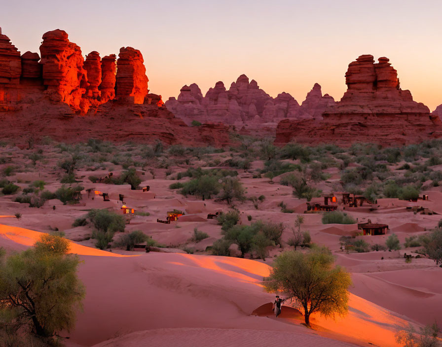 Red Sandstone Formations and Sand Dunes in Desert Dusk