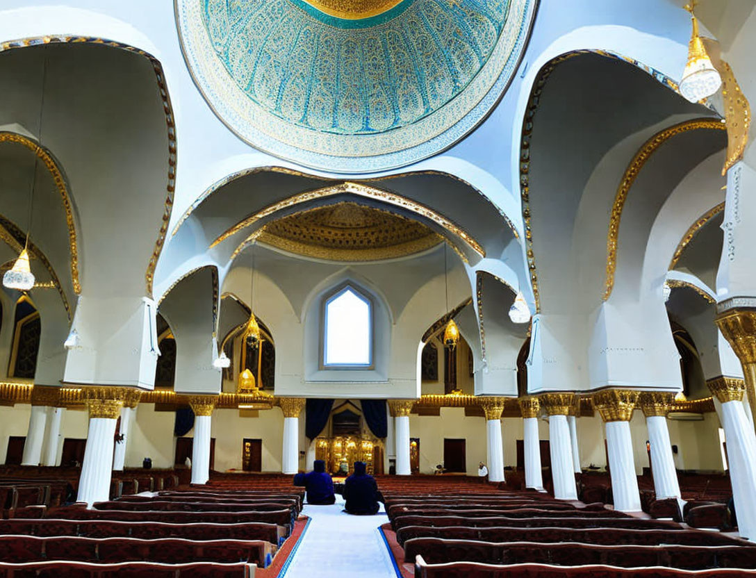 Ornate Mosque Interior with Blue Dome and Chandeliers