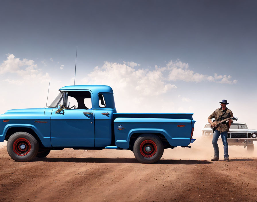 Person with Guitar by Vintage Blue Pickup Truck on Dirt Road