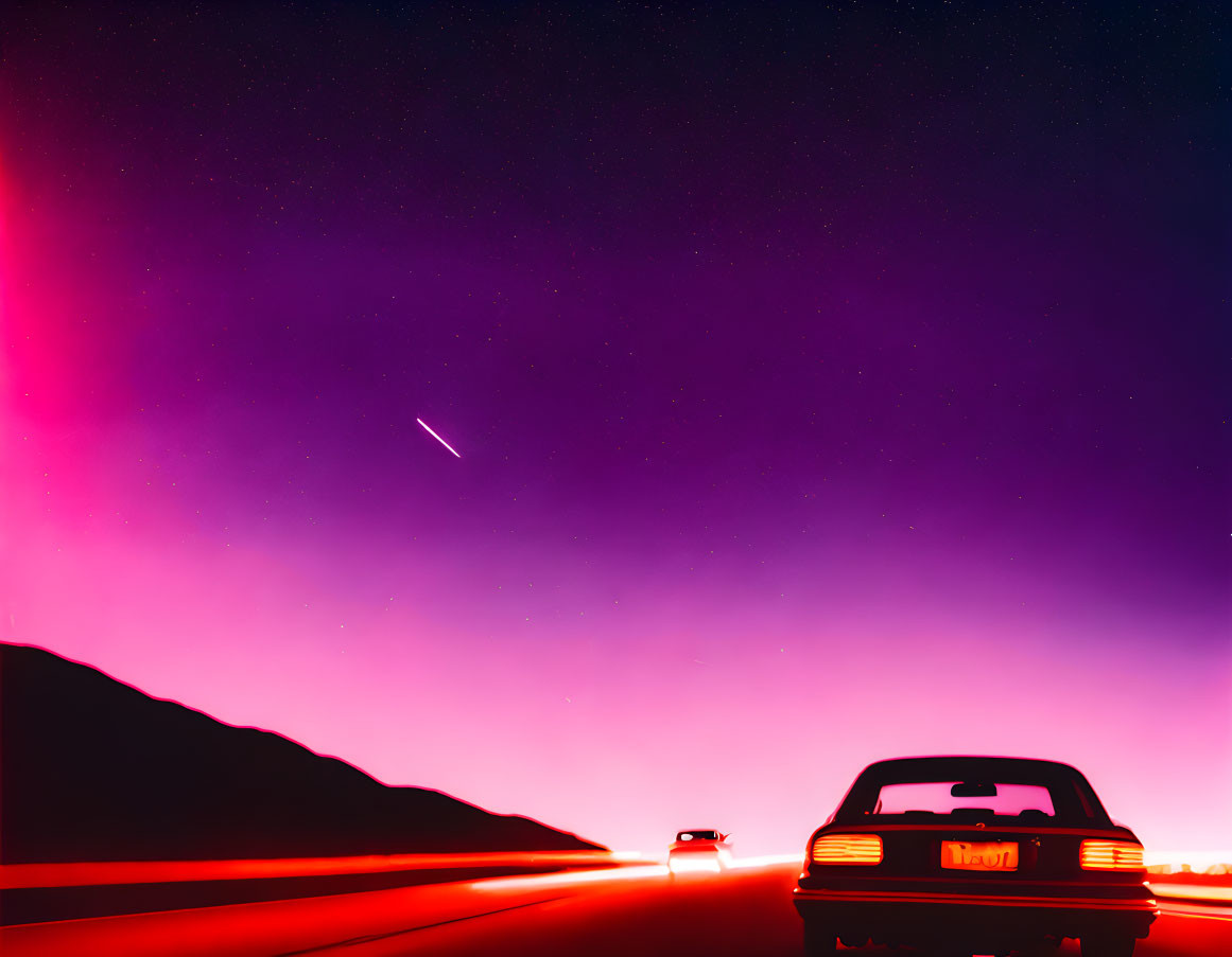 Car Driving on Road at Twilight Under Vibrant Pink and Purple Sky