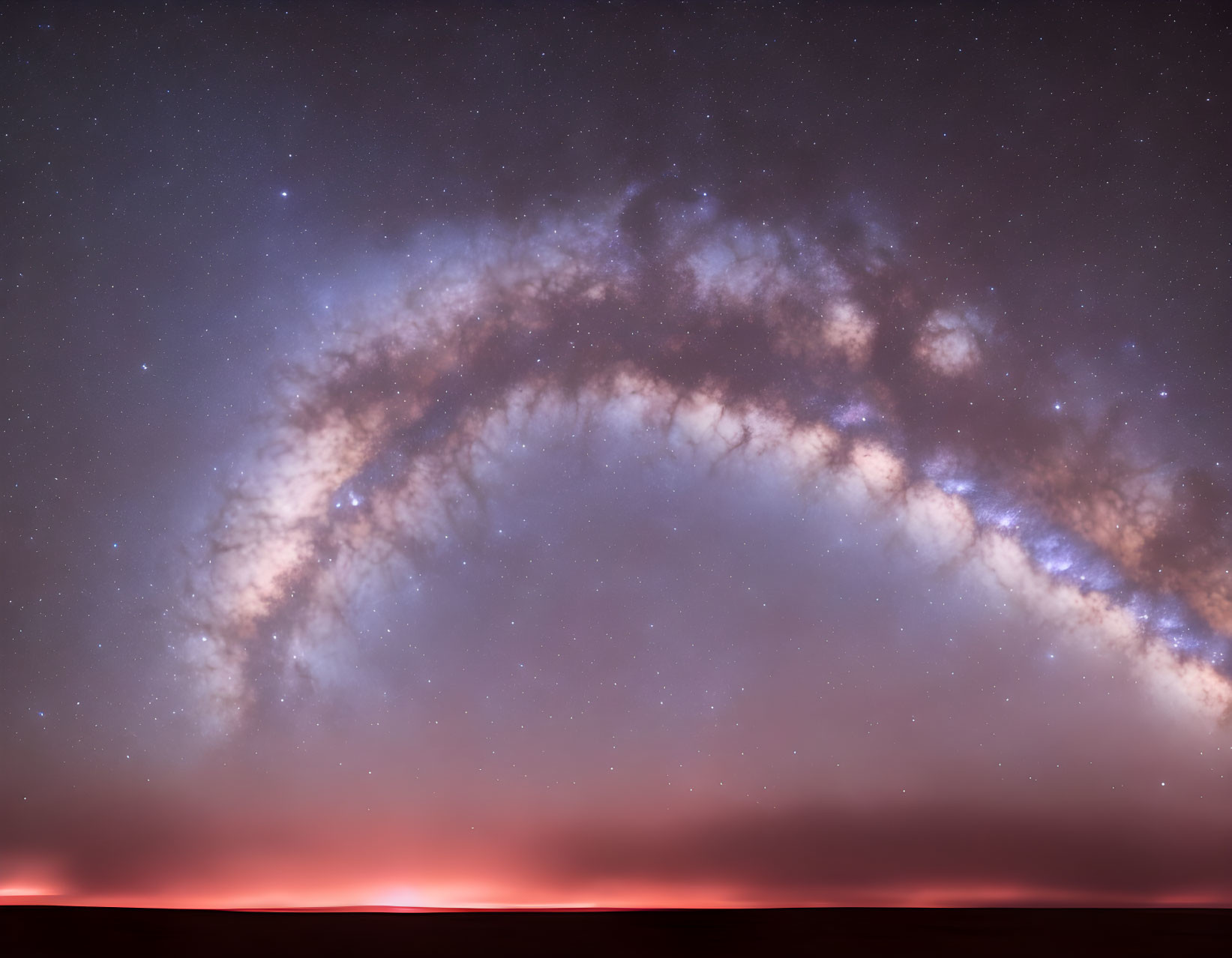 Stunning Milky Way Panorama Over Dimly Lit Horizon