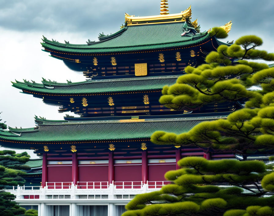 Traditional East Asian temple with multi-tiered roofs and golden ornaments set against lush green pines under a