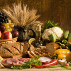 Assorted gourmet food items on rustic backdrop