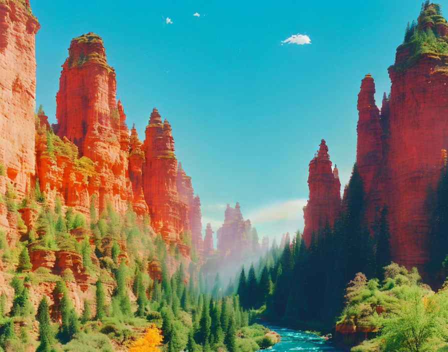 Majestic red rock formations above green forest and blue river