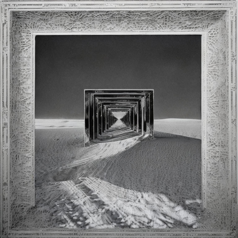 Monochrome photo of ornate frame structure on sand, forming infinite tunnel effect.