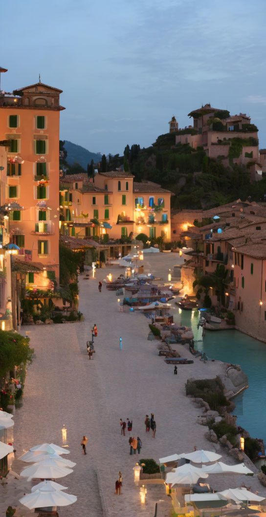 European-style Street at Twilight with Illuminated Buildings and Waterway