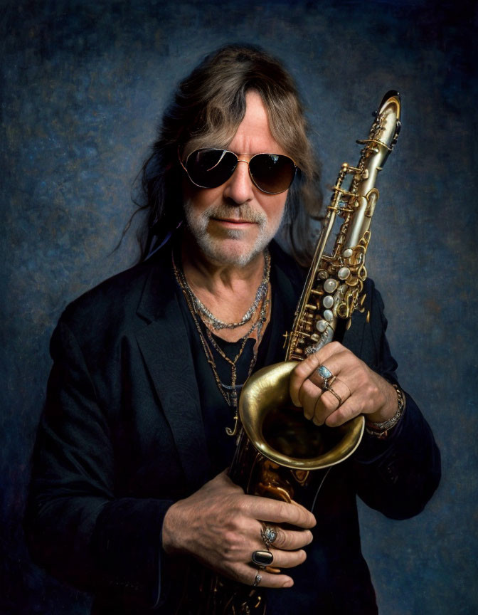 Long-haired man in sunglasses with saxophone, black blazer, necklaces, and rings