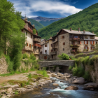 Alpine homes next to cascading stream in mountain village