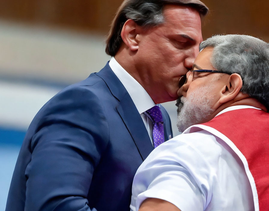 Men in formal attire greeting with cheek kiss.