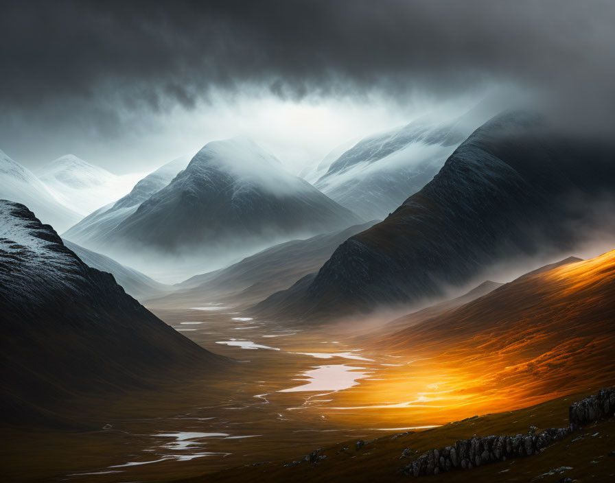 Sunlight illuminates golden valley between snow-capped mountains