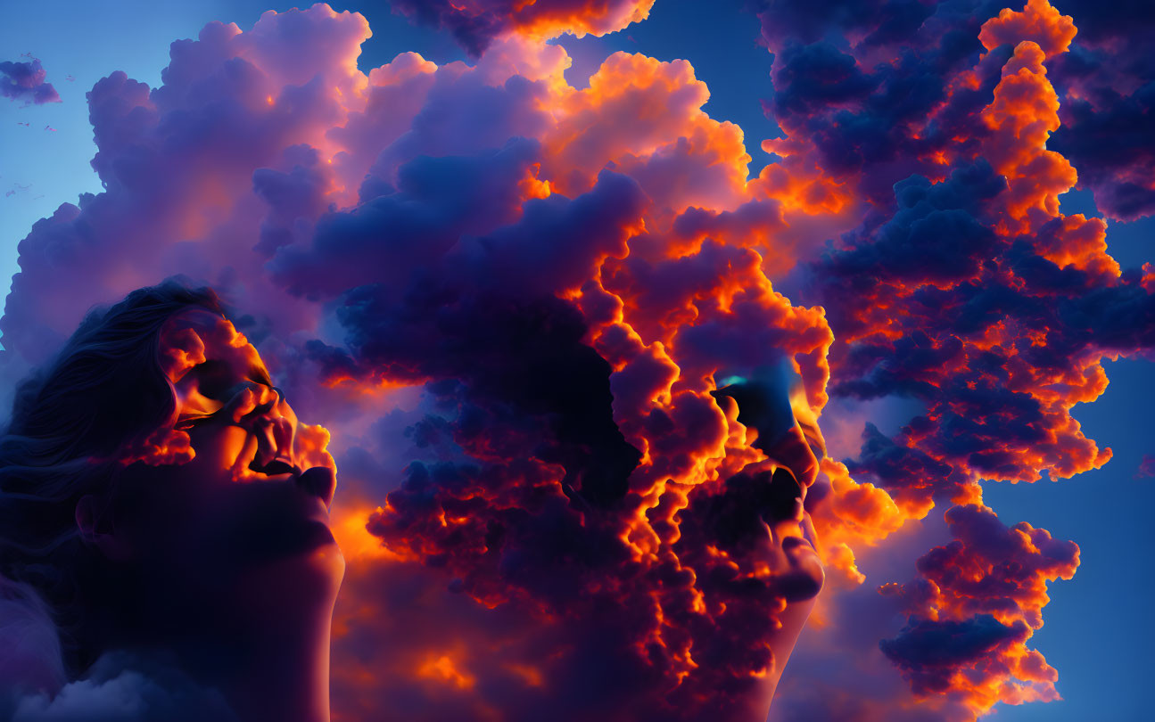 Digital artwork: Woman's profile merged with vibrant orange and blue clouds