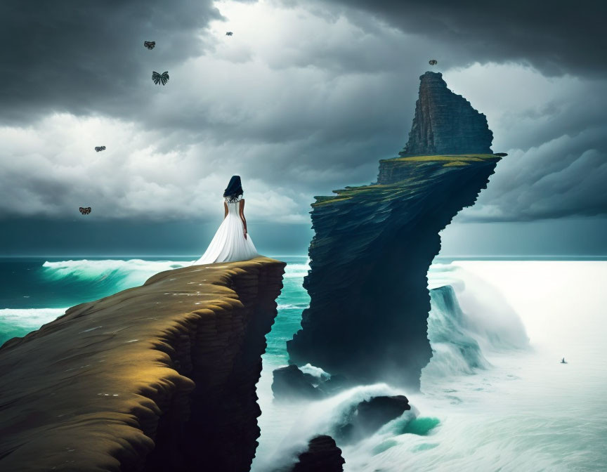 Person overlooking tempestuous sea with rock formation under stormy skies