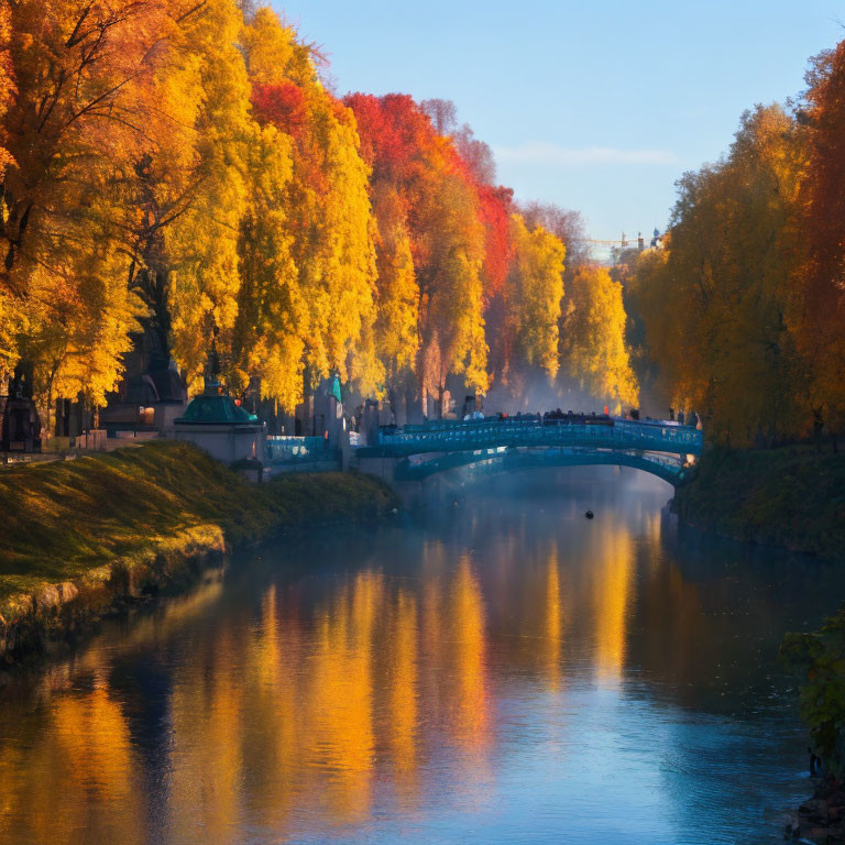 Tranquil autumn river landscape with vibrant trees and blue bridge