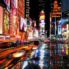 Vibrant watercolor painting of a city street at night with neon signs and reflections