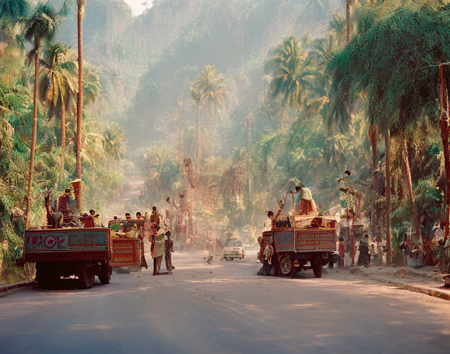 Vibrant rural street scene with palm trees, colorful trucks, and people in soft light