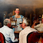 Tavern scene painting with three people and beer bottles